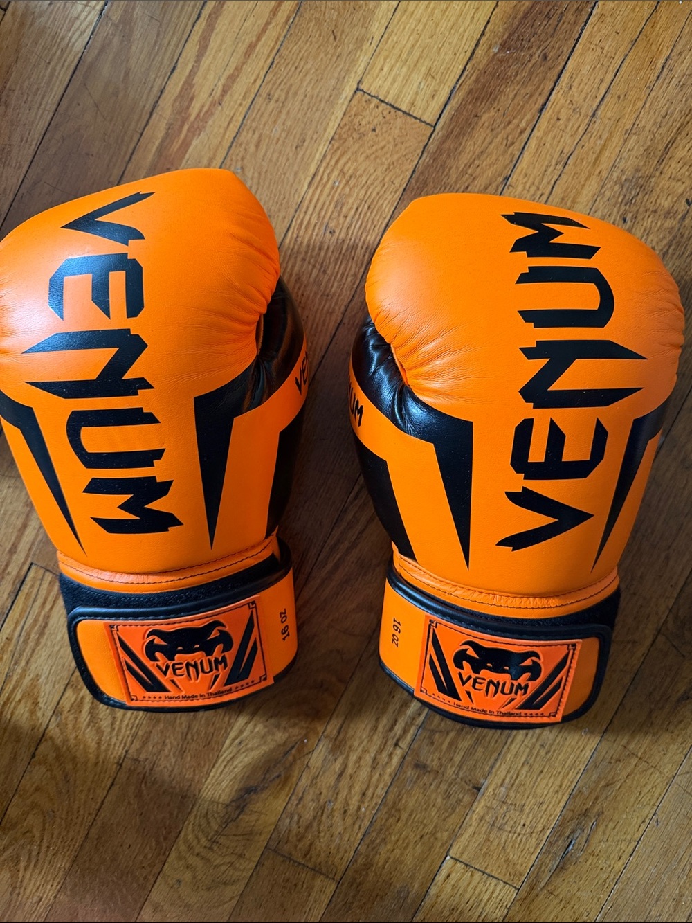 Venum Orange Boxing Gloves with Black Accents